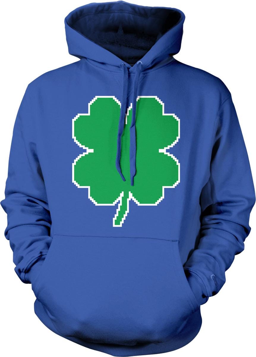 A blue hoodie with a green four-leaf clover design on the front.