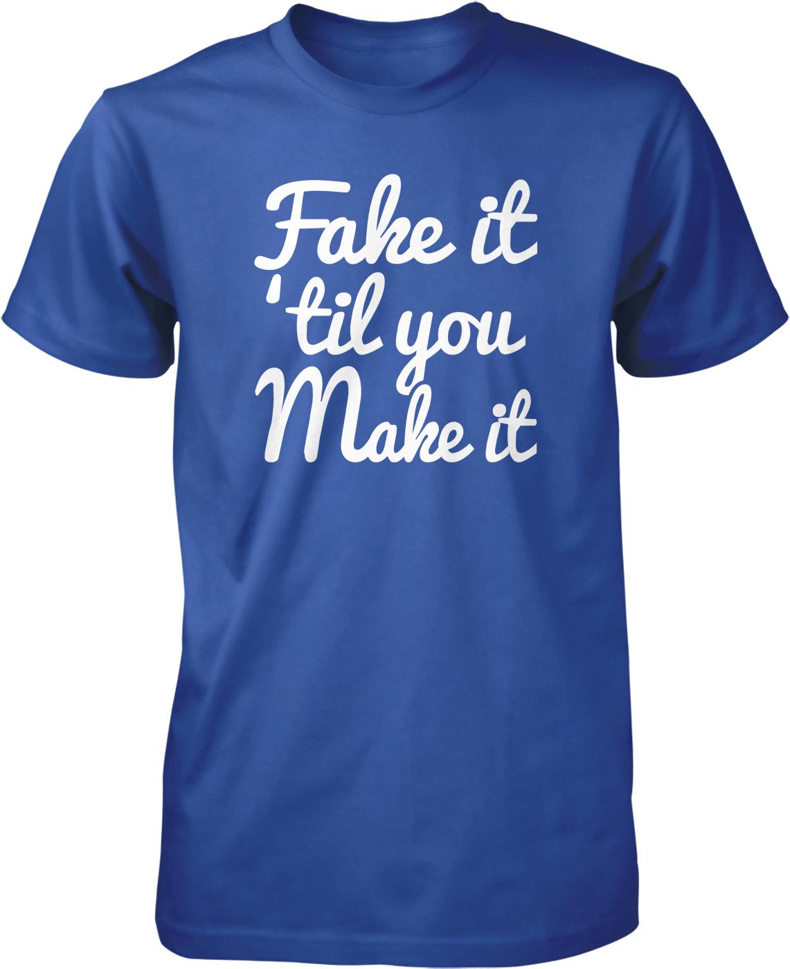 A blue t-shirt with white text that reads "Fake it 'til you Make it".