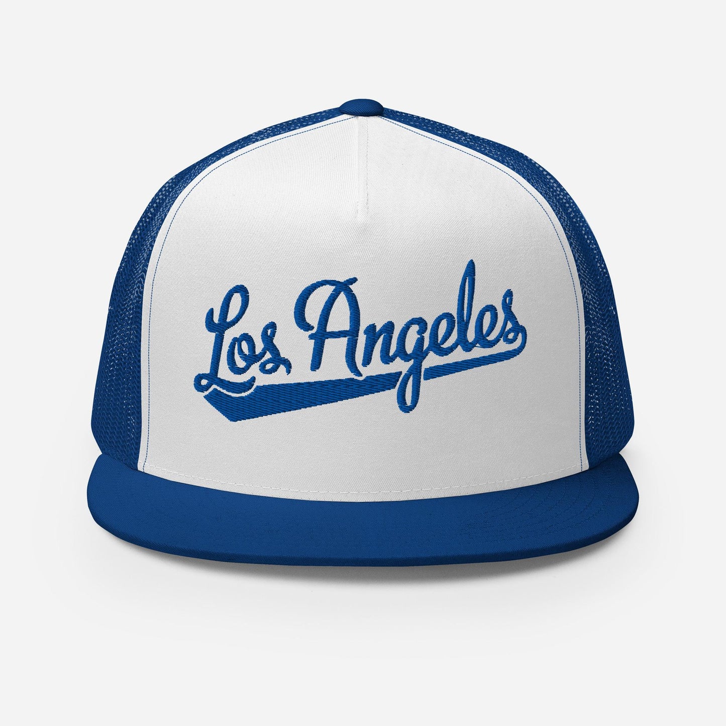 A white and blue baseball cap with the text "Los Angeles" printed on it.
