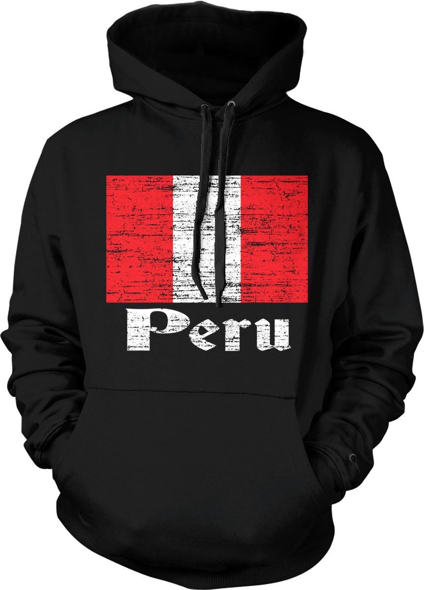 A black hoodie with a graphic design featuring the flag of Peru and the word "Peru" printed on it.