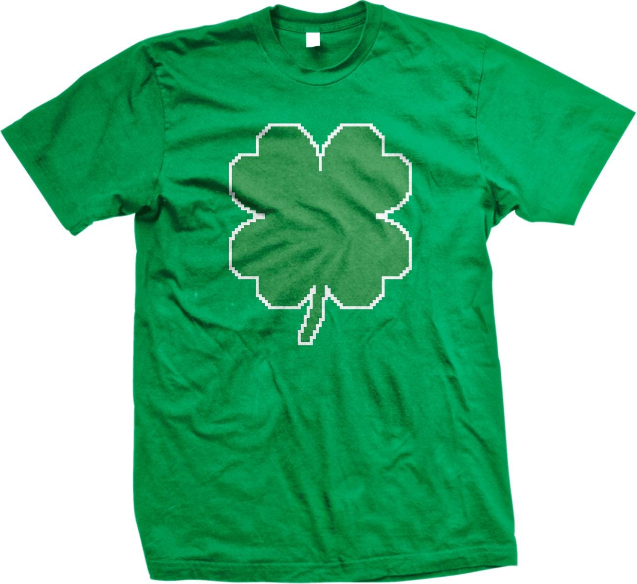 A green t-shirt with a white four-leaf clover graphic printed on it.