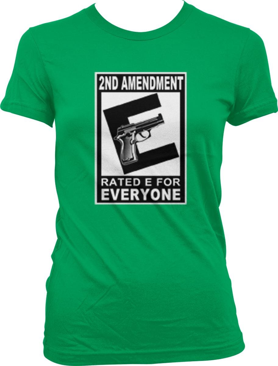 A green t-shirt with a graphic design featuring a gun and the text "2ND AMENDMENT RATED E FOR EVERYONE".
