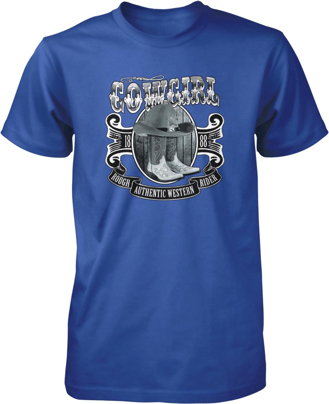 A blue t-shirt with a graphic design featuring a cowboy hat, boots, and the text "COWGIRL" prominently displayed.