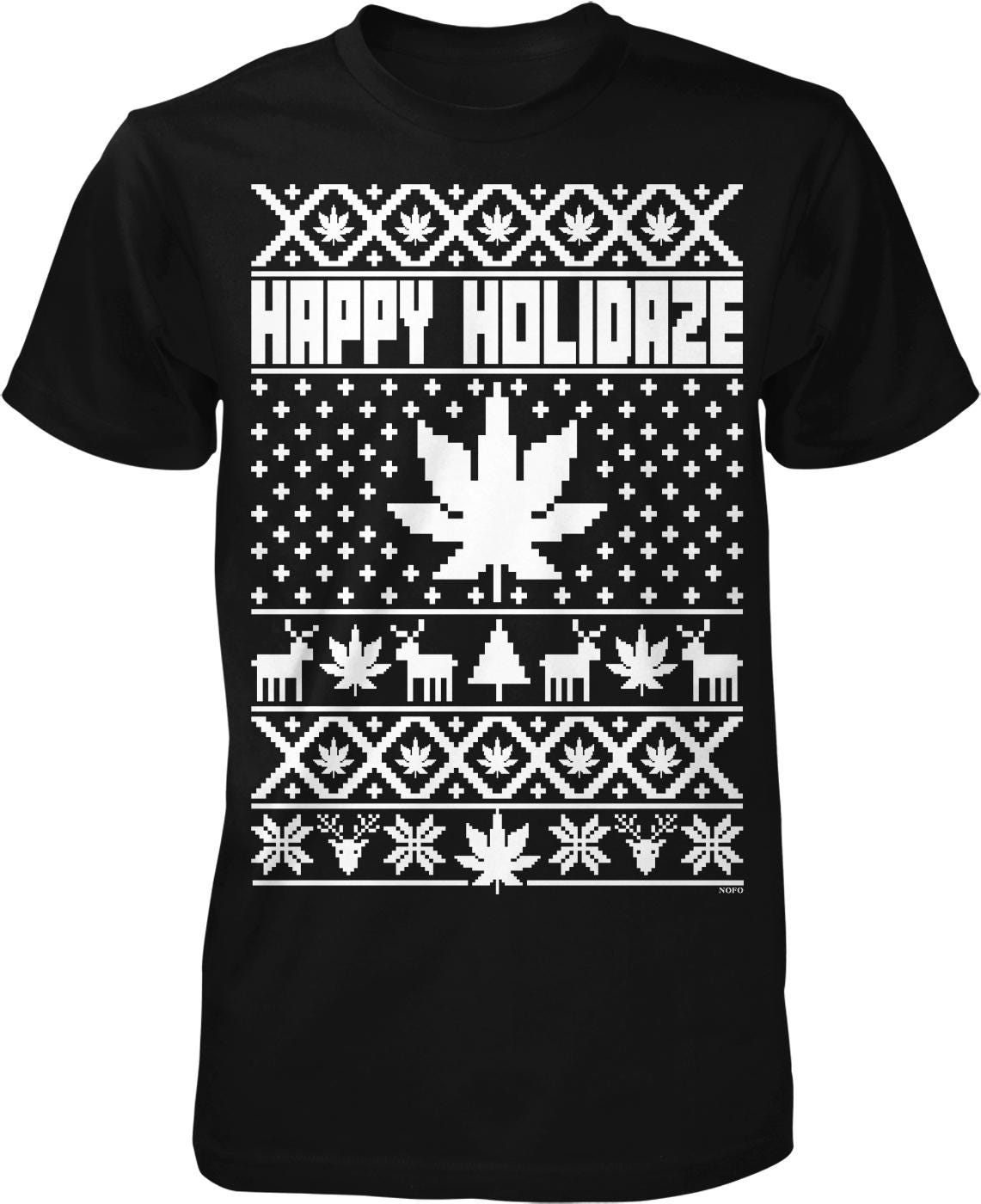 A black t-shirt with a white design featuring a Christmas tree, snowflakes, and deer. The text "HAPPY HOLIDAZE" is displayed above the design.