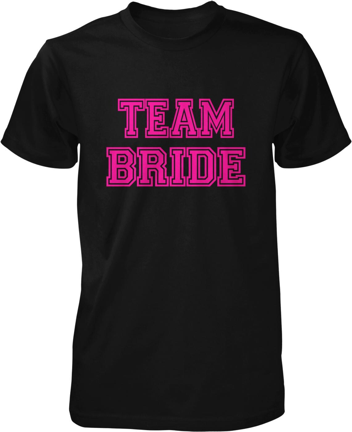 A black t-shirt with the text "TEAM BRIDE" printed in pink letters.