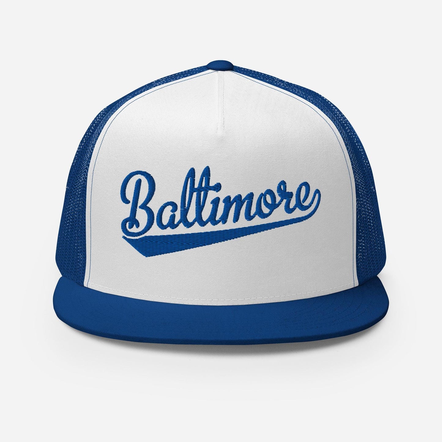 A white and blue baseball cap with the word "Baltimore" printed on it.