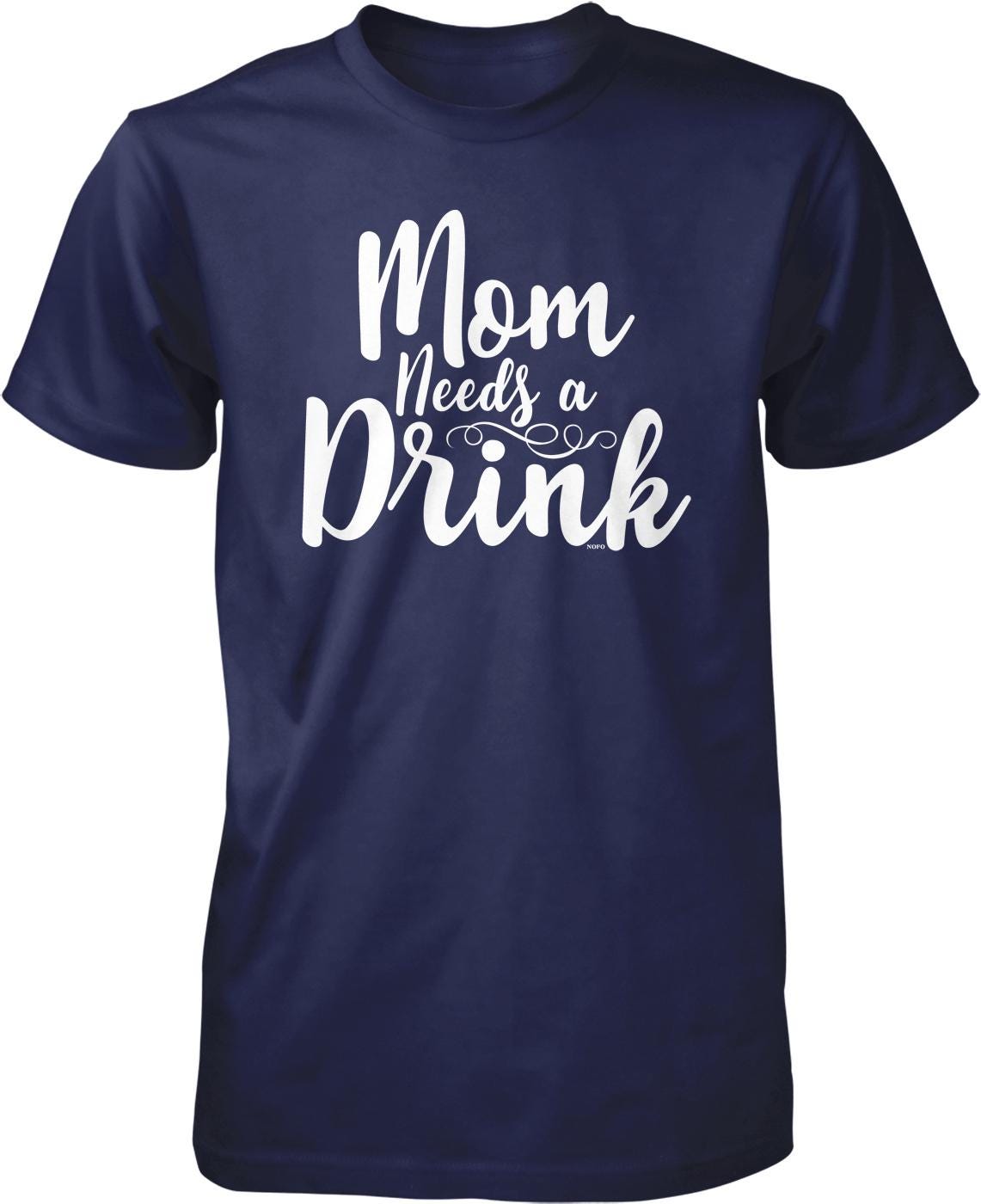 A navy blue t-shirt with the text "Mom Needs a Drink" printed on it in white lettering.