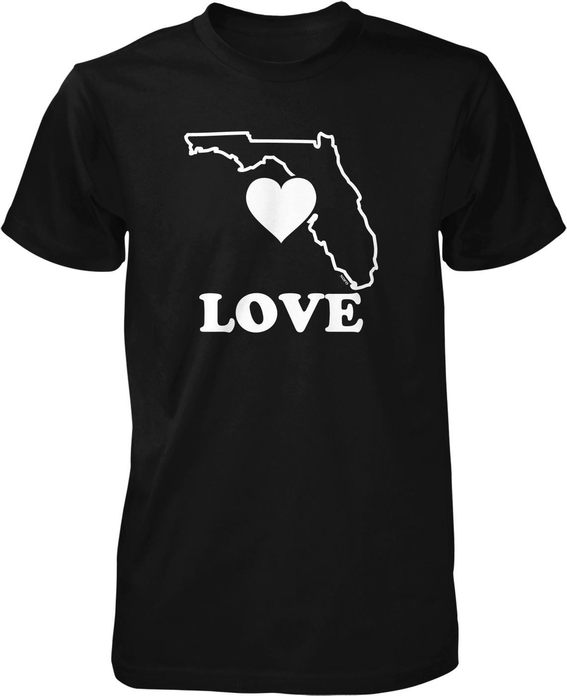 A black t-shirt with a white graphic design that includes a heart symbol and the word "LOVE" written below it.