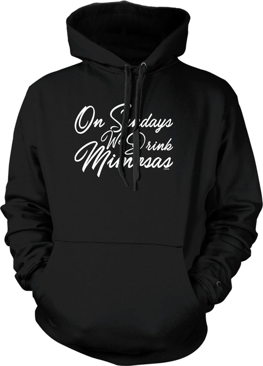 A black hoodie with white text that says "On Sundays we drink milkshakes".