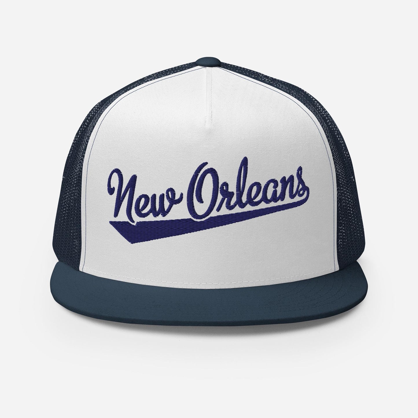 A beige baseball cap with the text "New Orleans" printed on it in a stylized font.