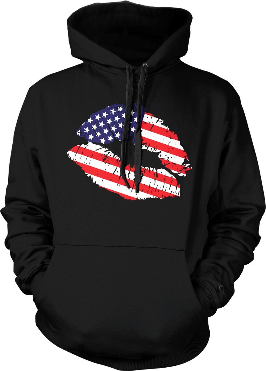 A black hoodie with a graphic design of a pair of lips in the shape of the American flag.