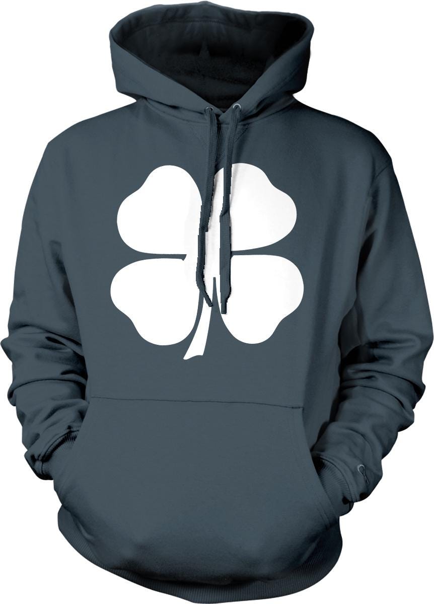 A navy blue hoodie with a white four-leaf clover graphic printed on it.