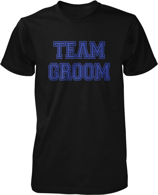 A black t-shirt with the text "TEAM GROOM" printed in blue letters.