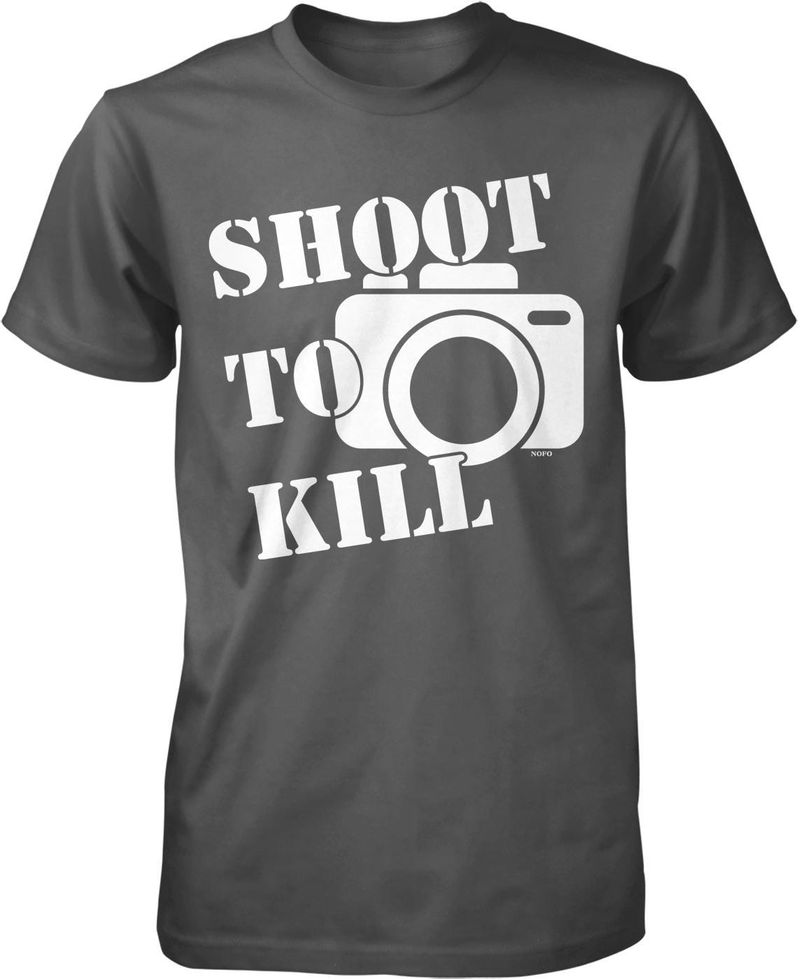 A gray t-shirt with the text "SHOOT TO KILL" printed on it, along with a graphic of a camera.