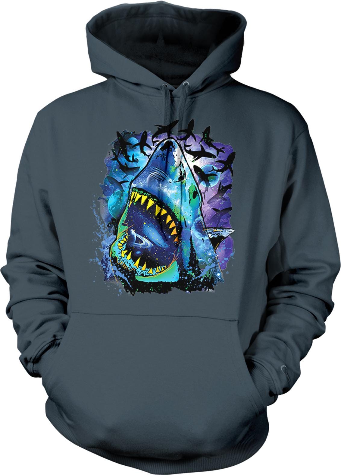 A hoodie with a graphic design depicting a shark with its mouth open, surrounded by colorful elements such as blue, purple, and green.