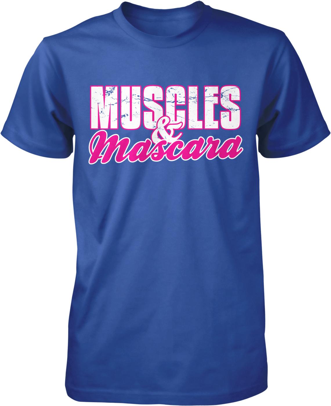 A blue t-shirt with the text "MUSCLES & MASCARA" printed on it in pink and white lettering.