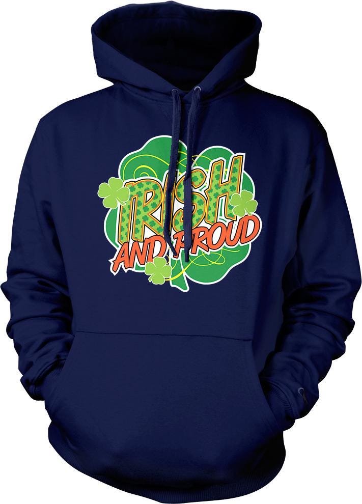 A navy blue hoodie with a graphic design featuring the text "IRISH AND PROUD" and shamrocks.
