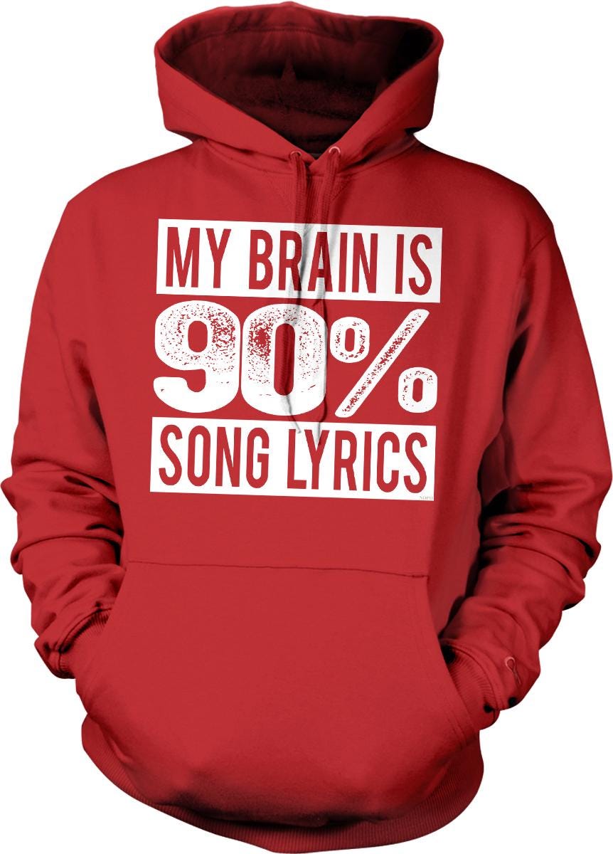 A red hoodie with white text that reads "MY BRAIN IS 90% SONG LYRICS".