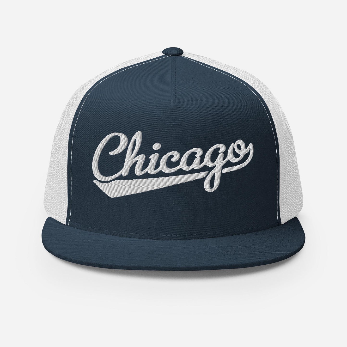 A navy blue baseball cap with the word "Chicago" embroidered on it in white lettering.