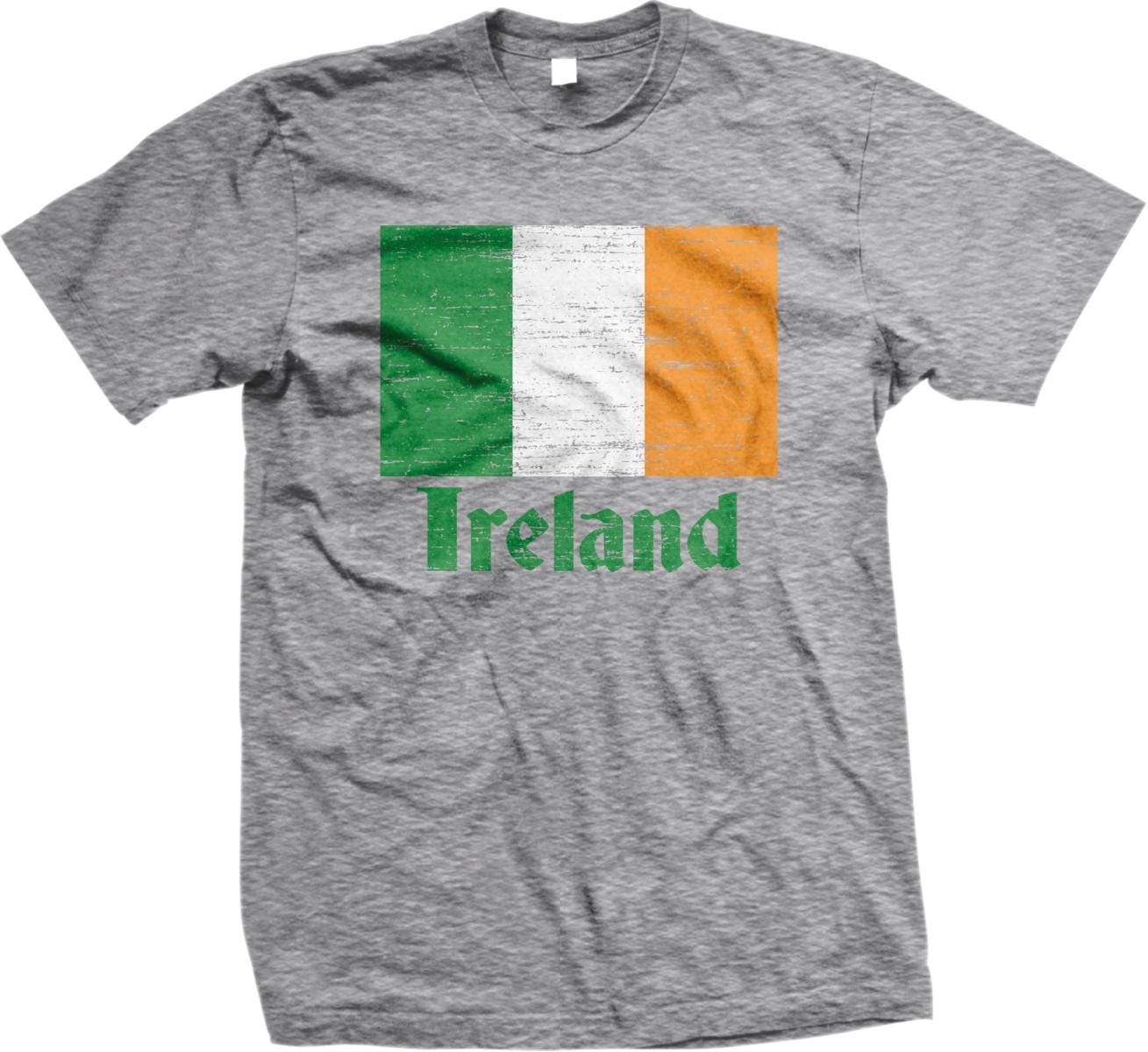 A grey t-shirt with the word "IRELAND" printed on it, along with the colors of the Irish flag.