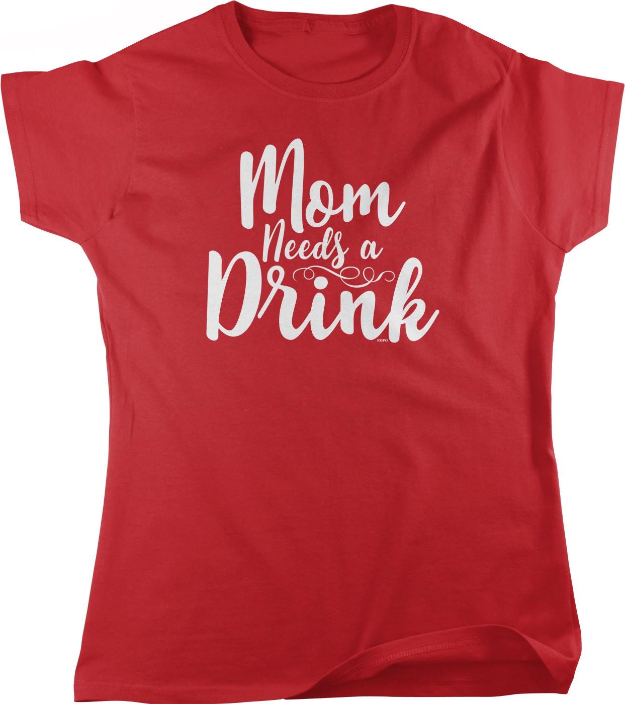 A red t-shirt with the text "Mom Needs a Drink" printed on it in white lettering.