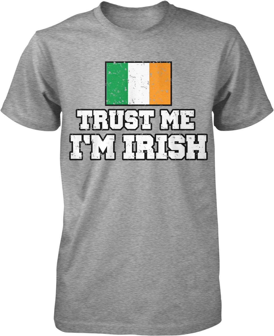 A gray t-shirt with the text "TRUST ME I'M IRISH" printed on it, along with a graphic of the Irish flag.