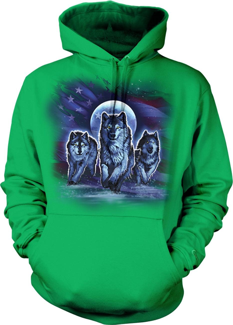 A green hoodie with a graphic design depicting three wolves against a night sky background with a full moon and stars.