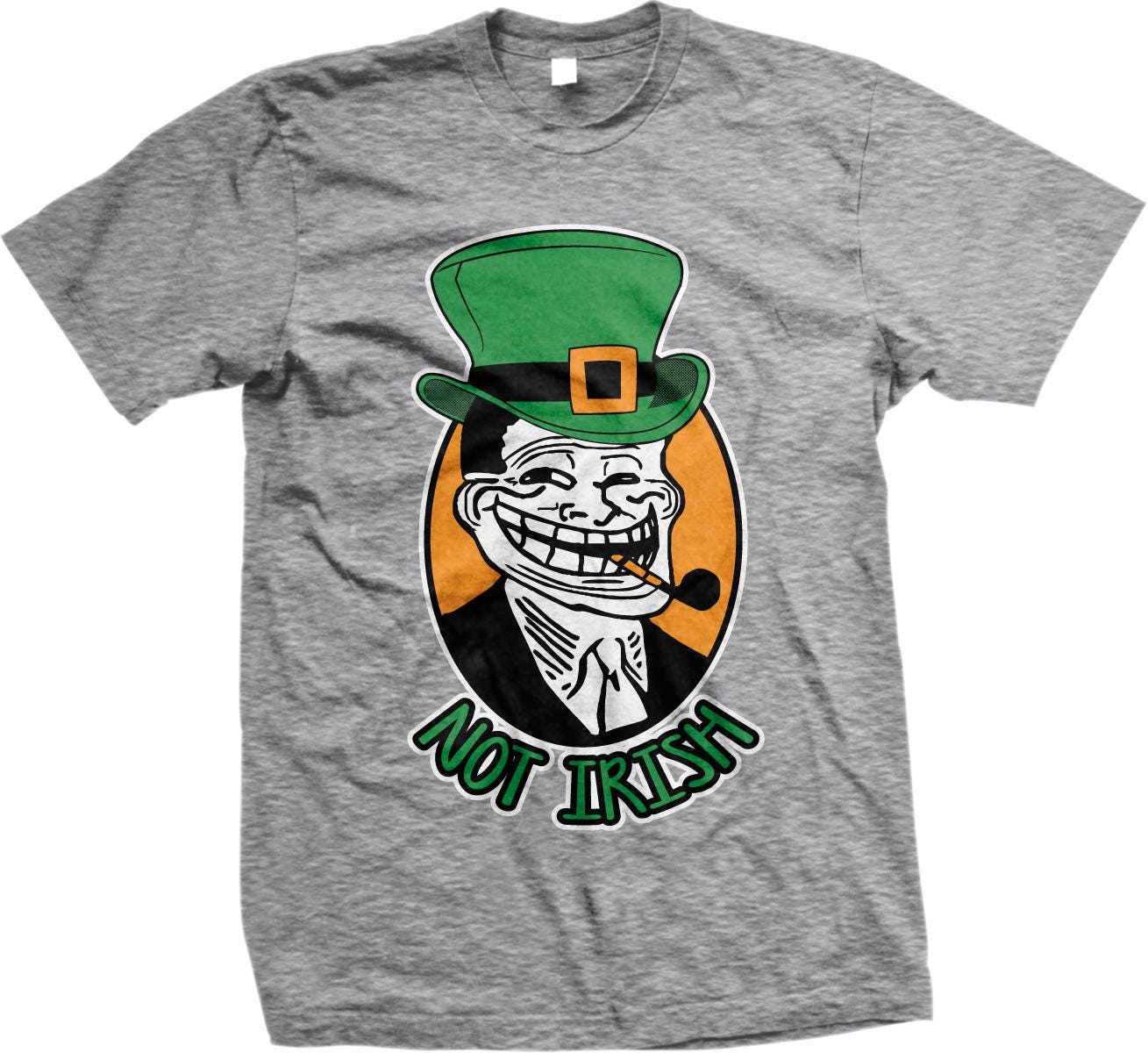 A gray t-shirt with a graphic design depicting a smiling, cartoonish character wearing a green top hat and holding a pipe. The text below the image says &quot;NOT IRISH&quot;.