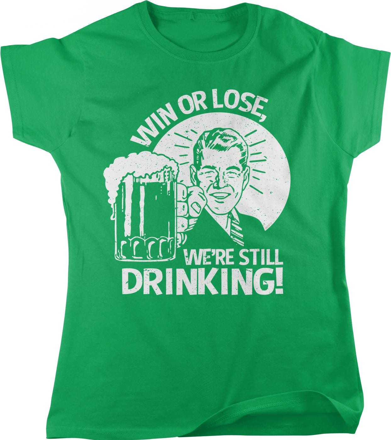 A green t-shirt with a graphic design depicting a man holding a beer mug and the text "WIN OR LOSE WE'RE STILL DRINKING!"