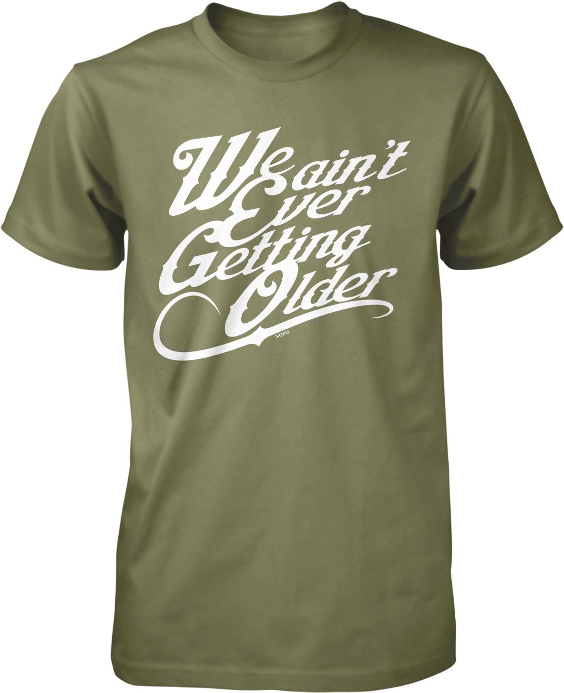 A green t-shirt with white text that reads "We ain't ever getting older".
