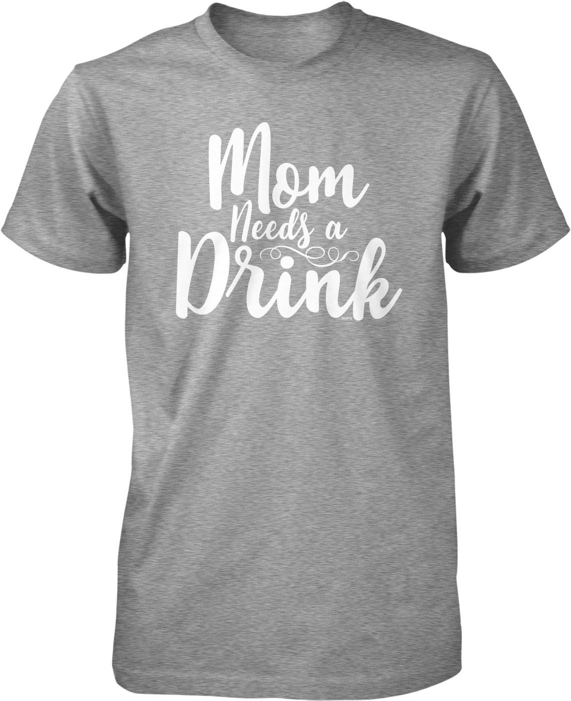 A gray t-shirt with the text "Mom Needs a Drink" printed on it in white lettering.
