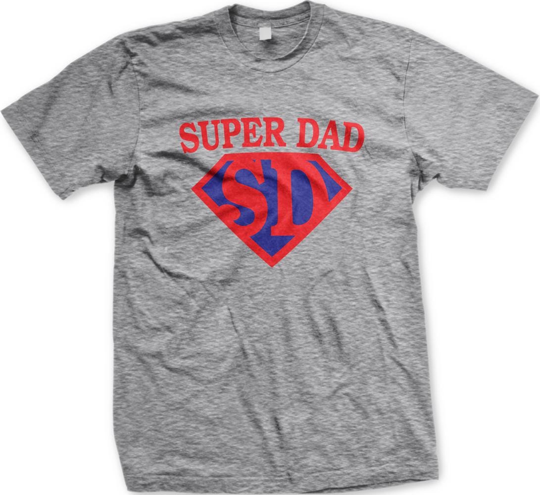 A gray t-shirt with the text "SUPER DAD SID" printed on it in red and blue colors.