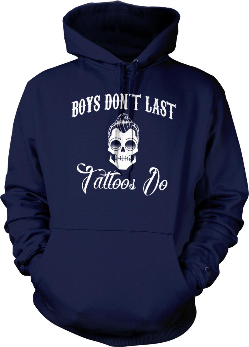 A navy blue hoodie with the text "BOYS DON'T LAST Tattoos Do" printed on it.