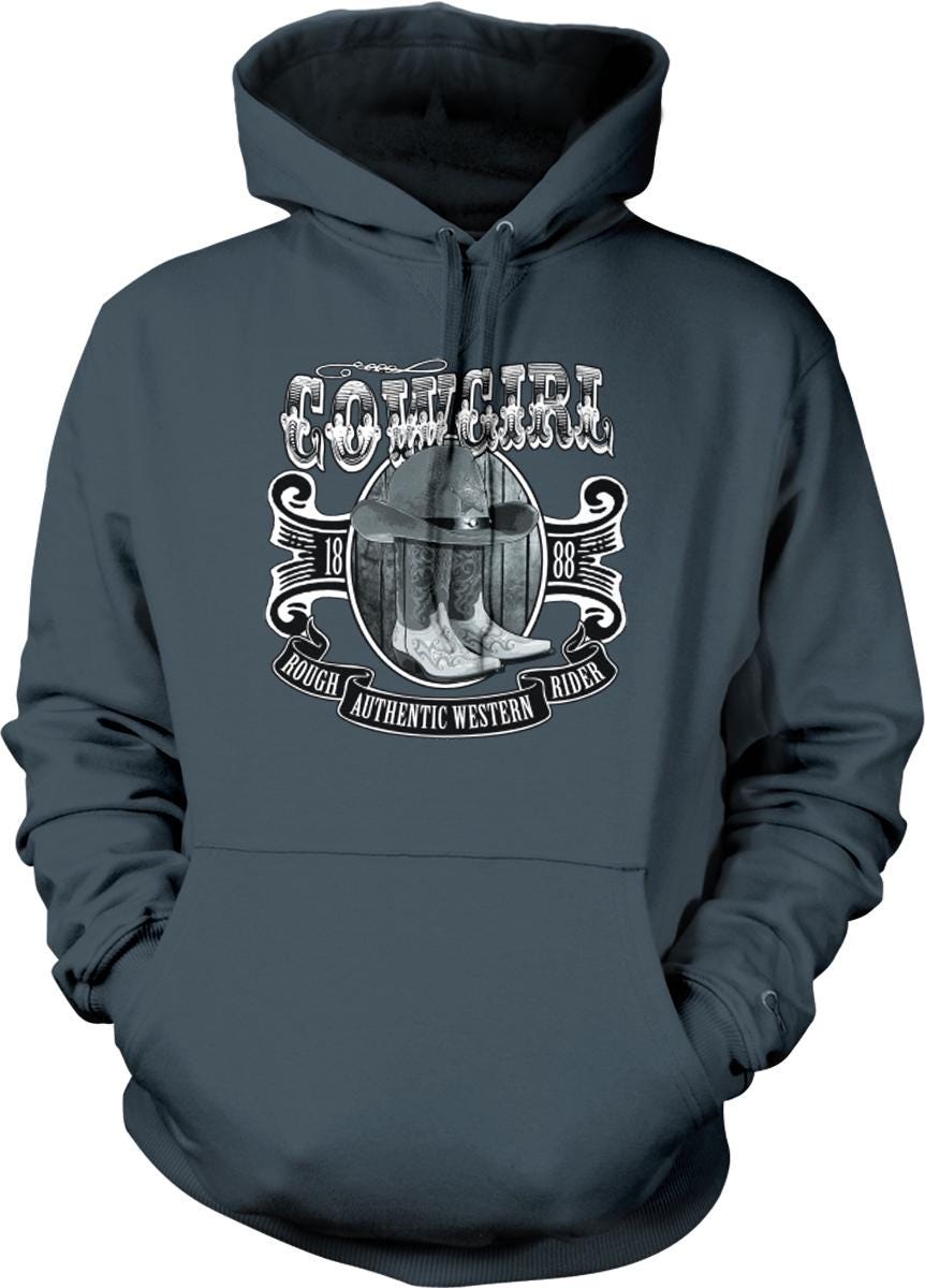 A dark grey hoodie with a graphic design featuring a cowboy hat and the text "COWgirl" prominently displayed.