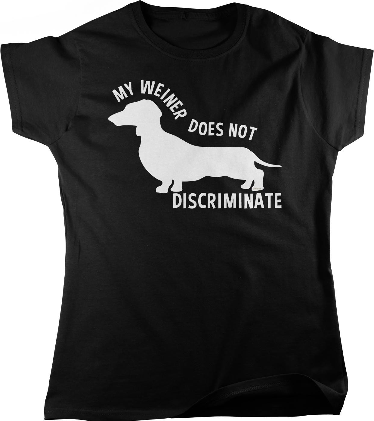 The image is a black t-shirt with a white graphic design depicting a dachshund dog and text that reads "MY WEINER DOES NOT DISCRIMINATE".