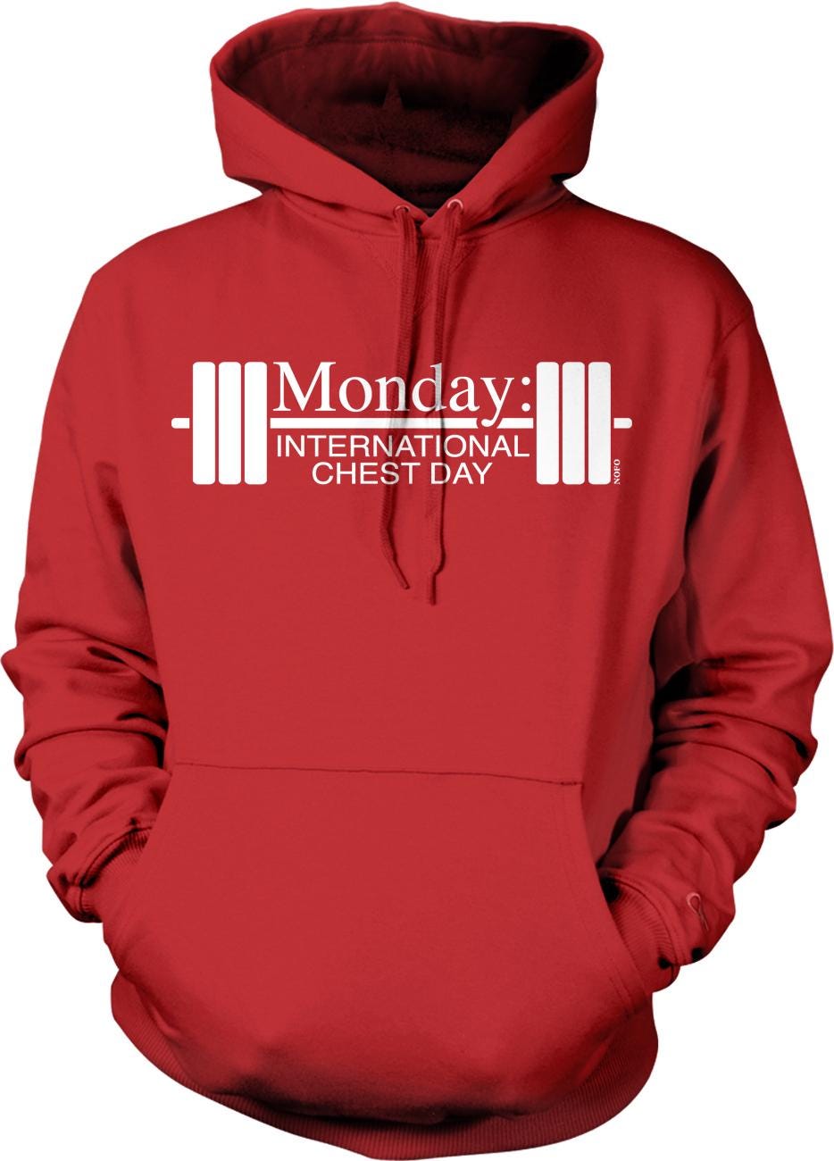 A red hoodie with the text "Monday: International Chest Day" printed on it.