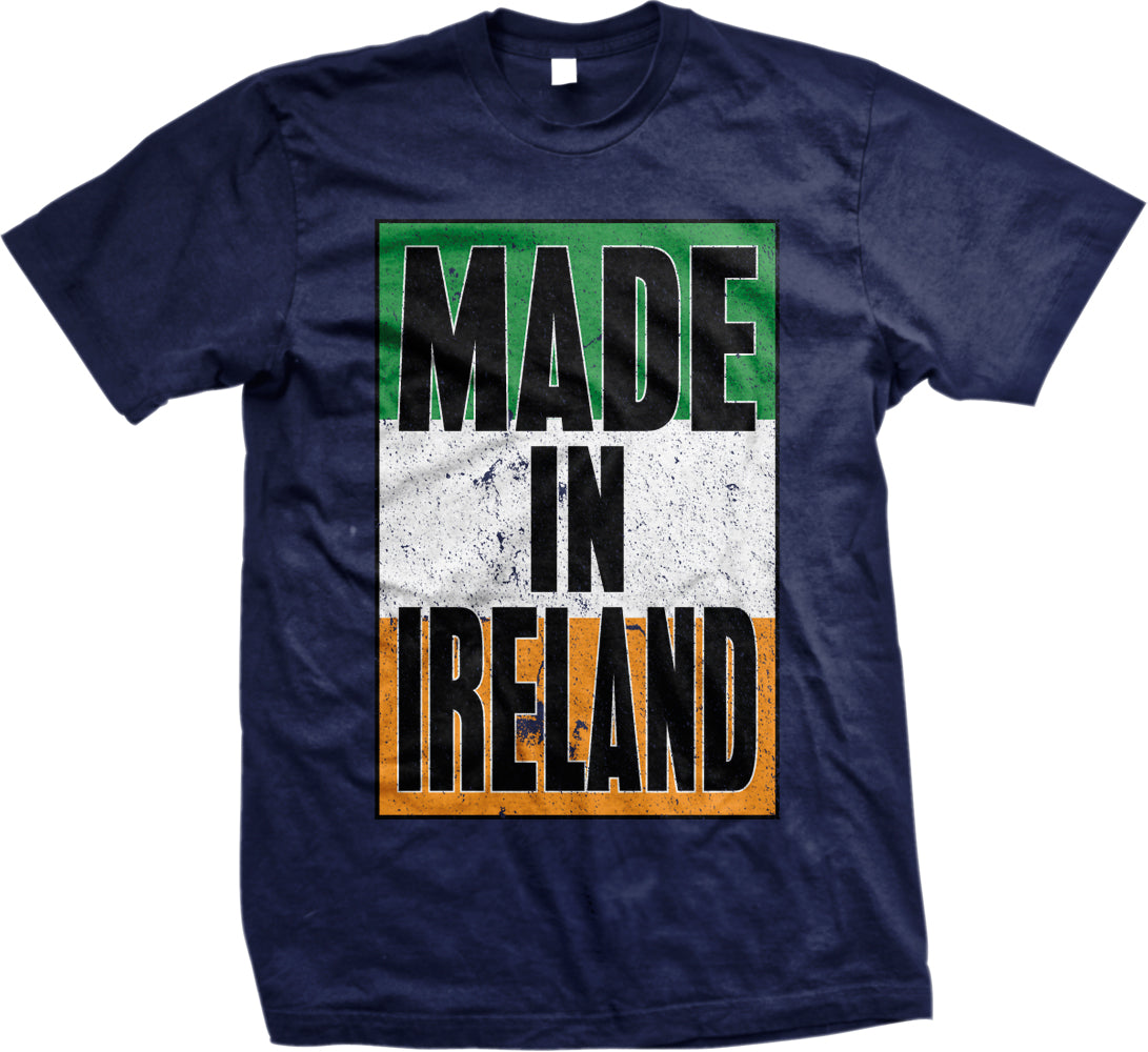A navy blue t-shirt with the text "MADE IN IRELAND" printed on it in a bold, graphic style.