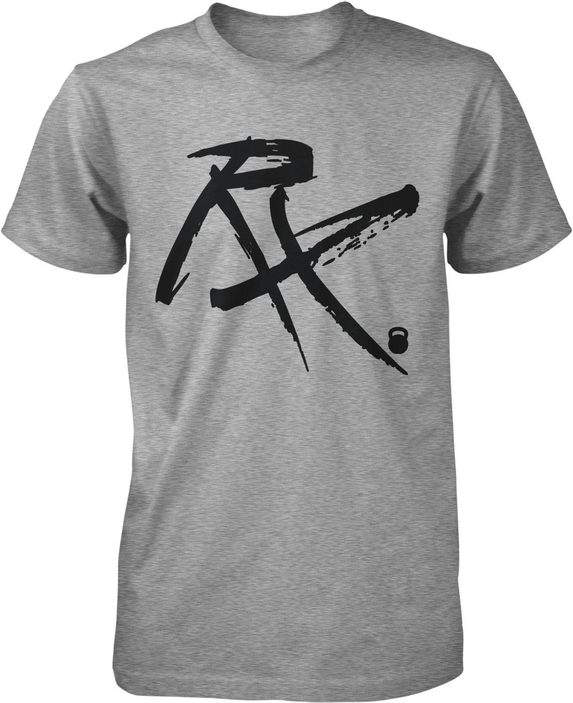 A gray t-shirt with a black graphic design featuring a stylized letter "R" and a kettlebell symbol.