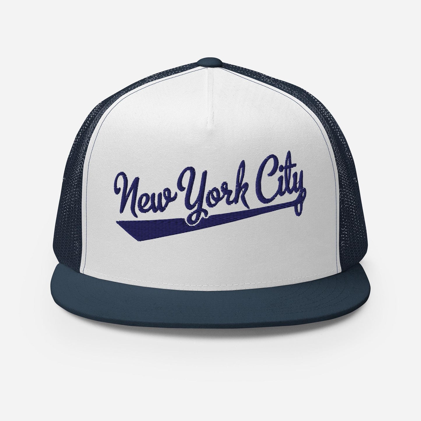 A white and navy blue baseball cap with the text "New York City" printed on it.