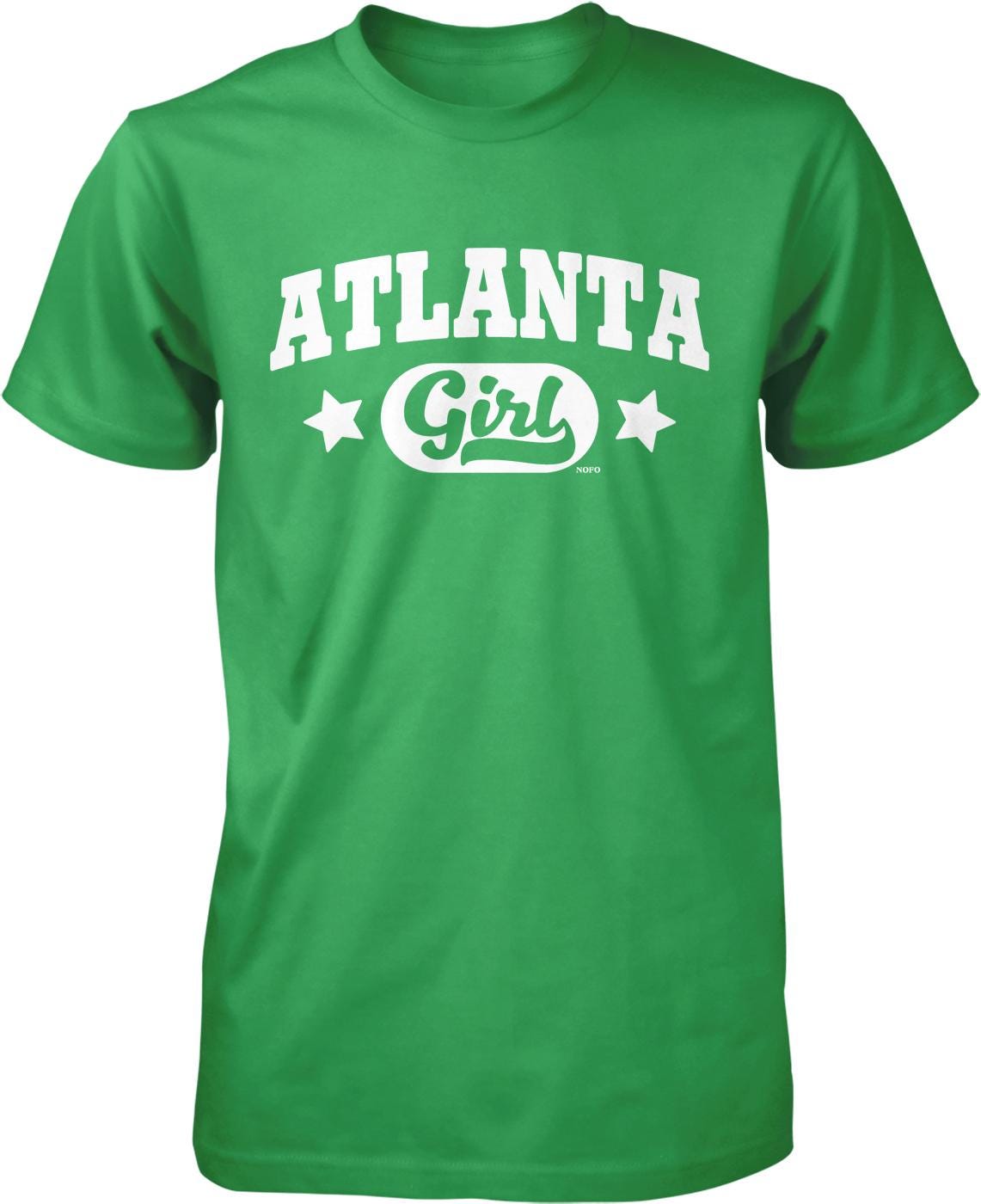 A green t-shirt with the text "ATLANTA Girl" printed on it.