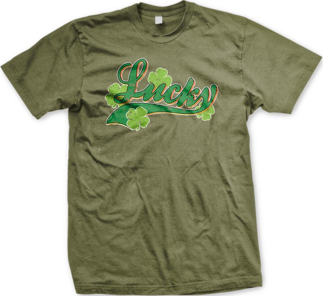 A green t-shirt with the word "Lucky" printed on it, along with four shamrocks.