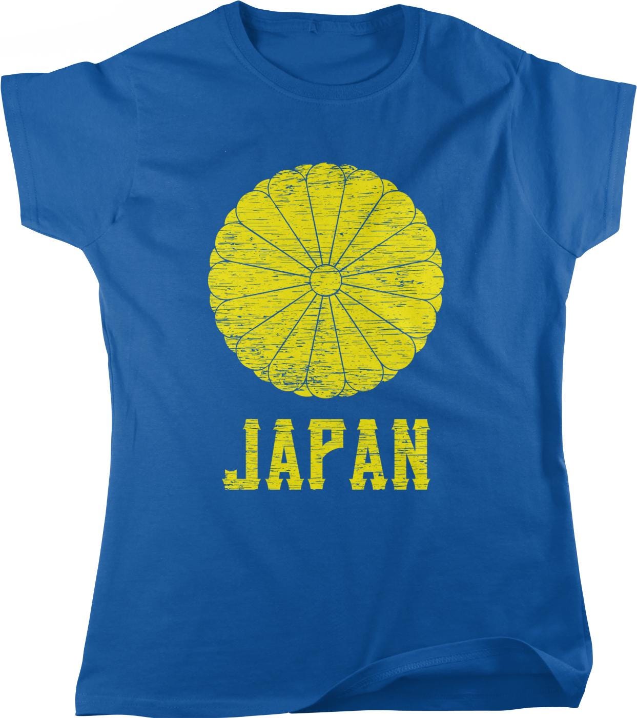 A blue t-shirt with a yellow graphic design depicting a stylized sun or flower shape, and the word "JAPAN" printed below it.
