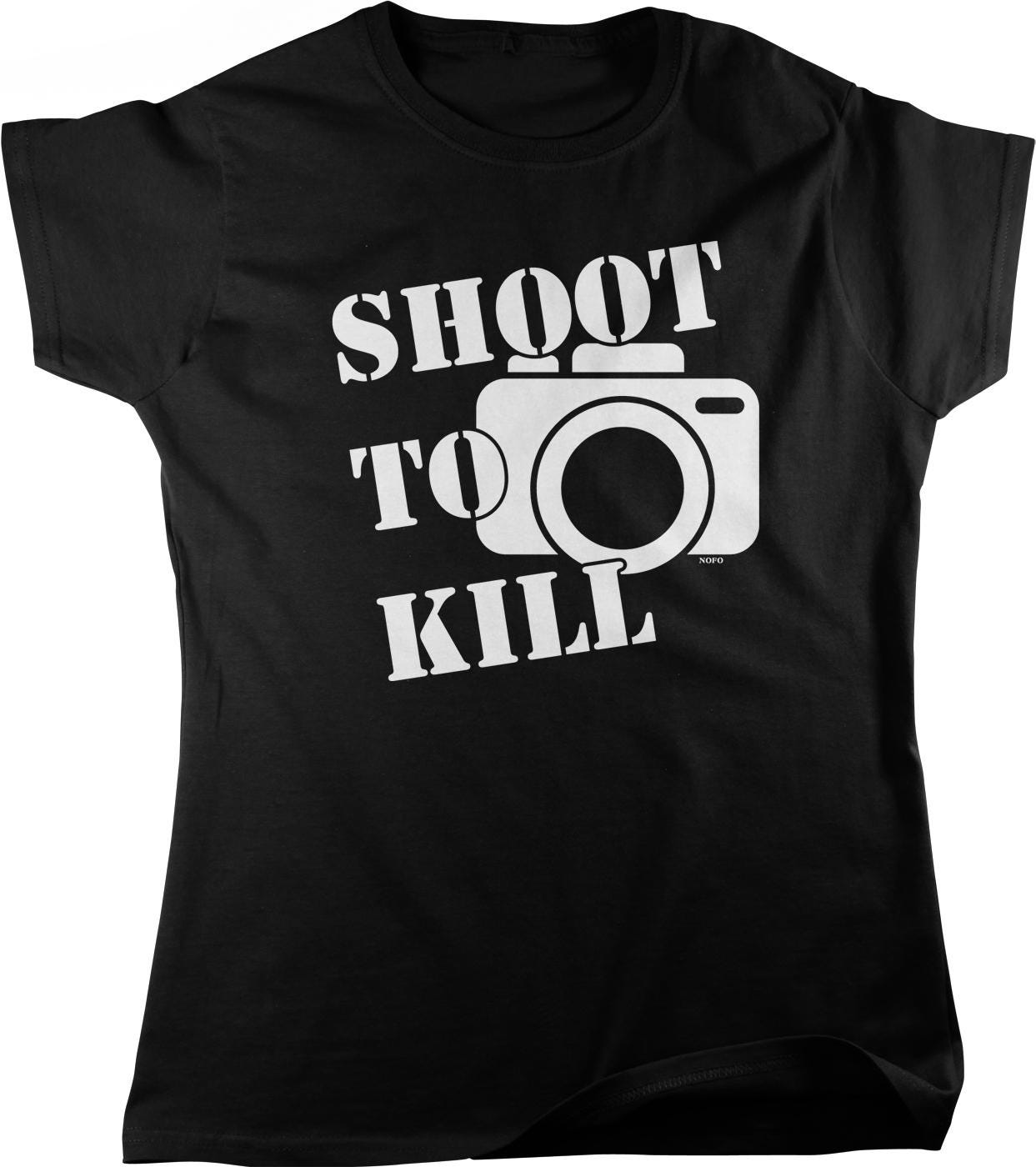 A black t-shirt with the text "SHOOT TO KILL" printed on it, along with a graphic of a camera.