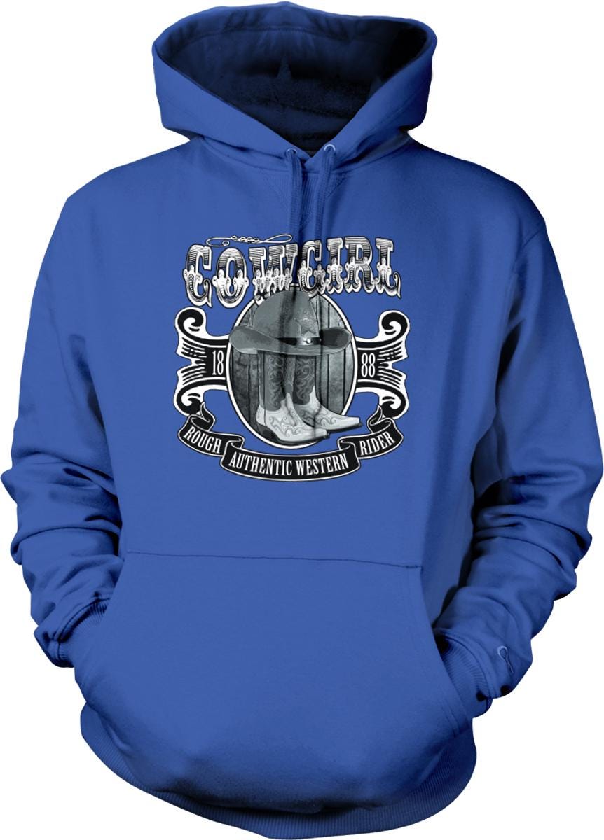 A blue hoodie with a graphic design featuring a cowboy hat, boots, and the text "COWBOY" prominently displayed.