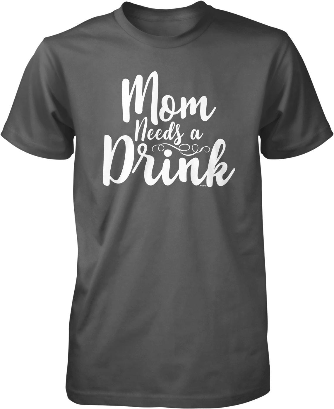 A gray t-shirt with the text "Mom Needs a Drink" printed on it in white lettering.