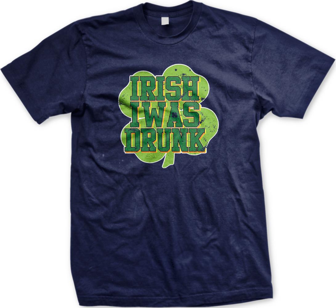 A navy blue t-shirt with a graphic design featuring the text "IRISH WAS DRINK" in a stylized font, surrounded by a shamrock symbol.