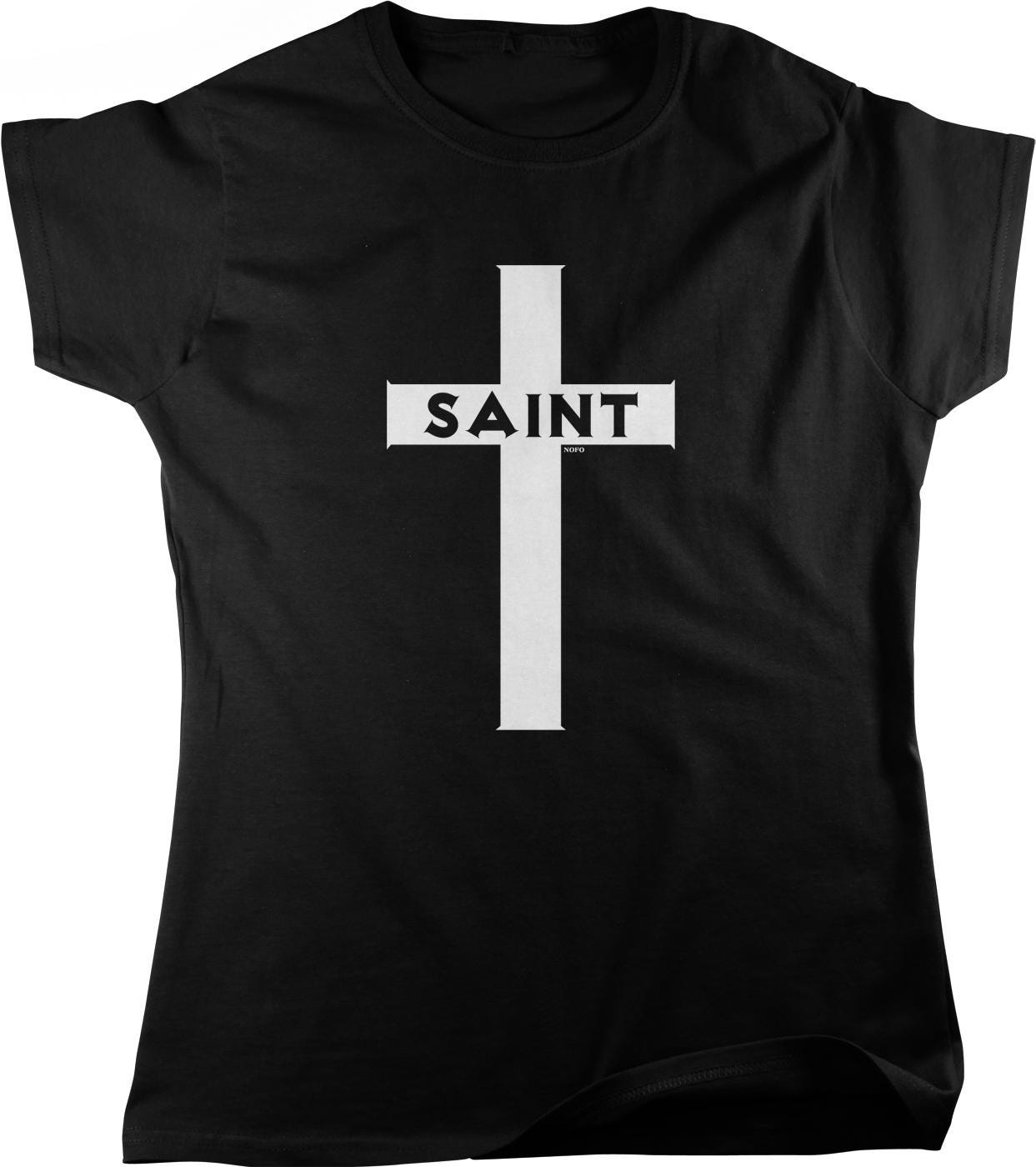A black t-shirt with a white cross graphic and the word "SAINT" printed on it.