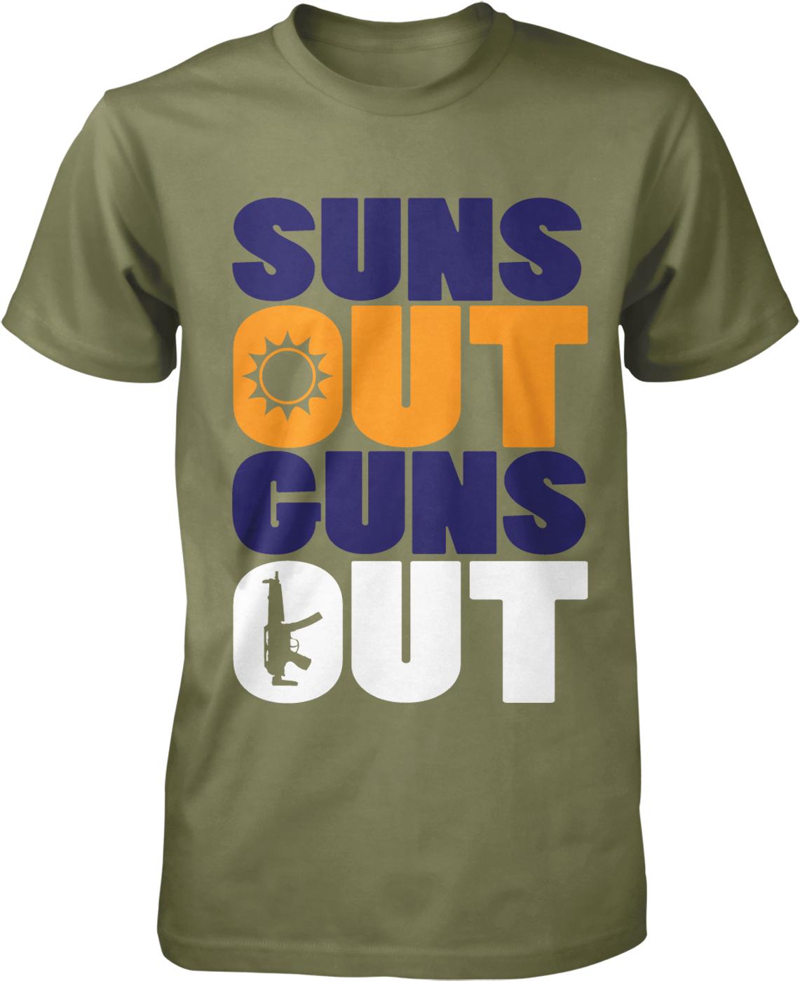 A green t-shirt with the text "SUNS OUT GUNS OUT" printed on it.