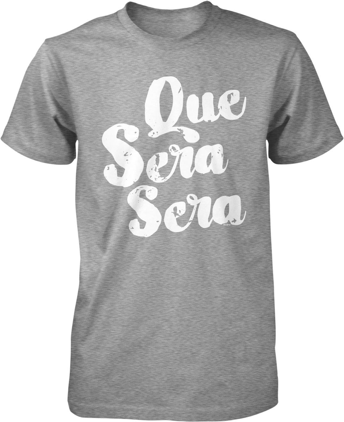 A gray t-shirt with white text that reads "Que sera sera" printed on it.
