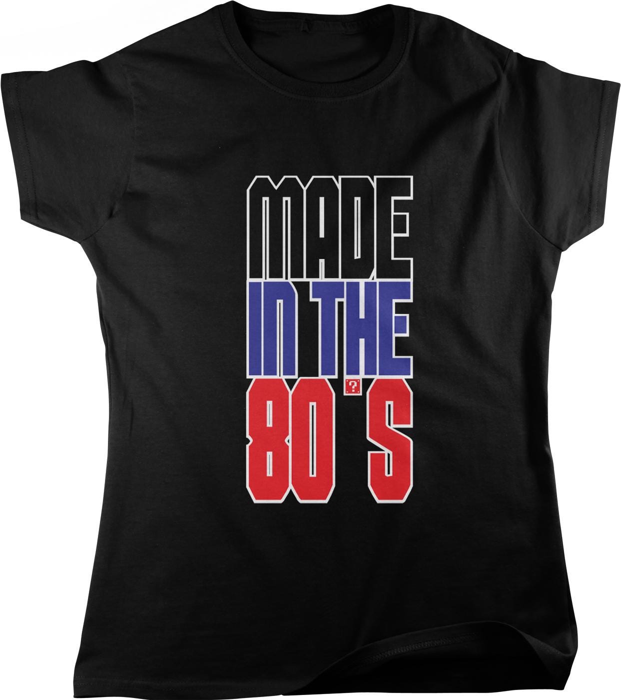 A black t-shirt with the text "MADE IN THE 80'S" printed on it in a bold, colorful font.